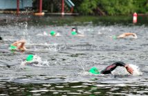 Swimmers churn up the Muskoka River