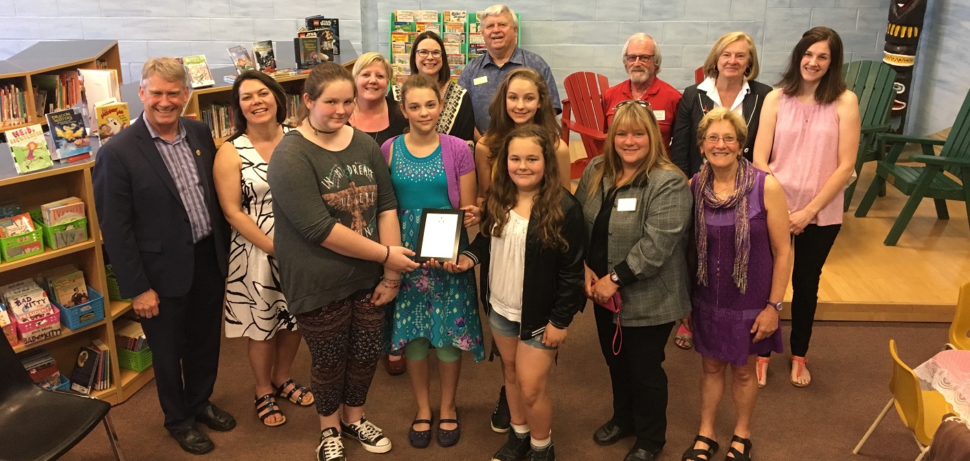YWCA Muskoka Girlz Unplugged participants celebrate an OTF GROW grant with staff and dignitaries