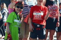 Siblings Maxwell and Lily Perry brought some good cheer vibes to Saturday morning's event.