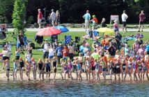 The 11 and 12 year old females wait for the swim start