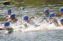The 9-year-old boys hit the water for the swim
