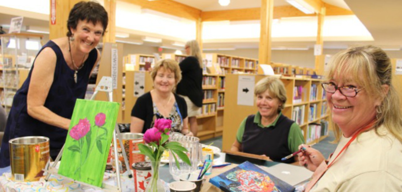Nancy Alcock, Karen Cassian, Karin Terziano and Diane Thoms are all smiles while working on their masterpieces.