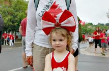 Maddie Whyte and grandma Diane Finlay cheer on the Decades Parade