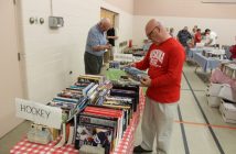 Derek Shelley tries to choose from the hundreds of books offered