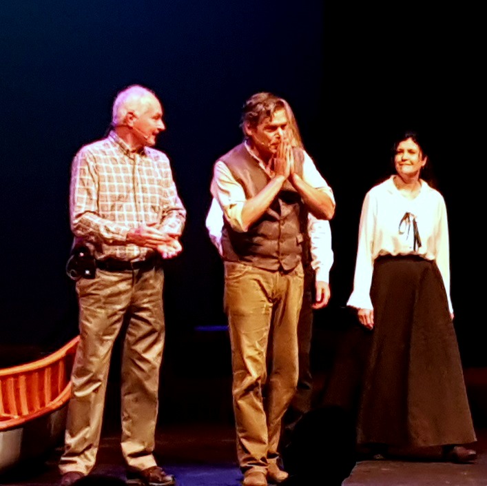 Grant Nickalls (centre) gestures his thanks to the audience at the end of When Winnie Knew