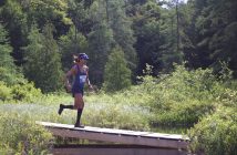 Neela DSouza from Pickering runs across a boardwalk on her way to completing the 56k (Photo: Jack Page)