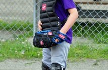 This young catcher is focused on the game