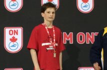Ethan Thomas with Gold in the 200m Fly