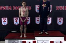 Ethan Thomas on the podium with Silver for the 400m IM