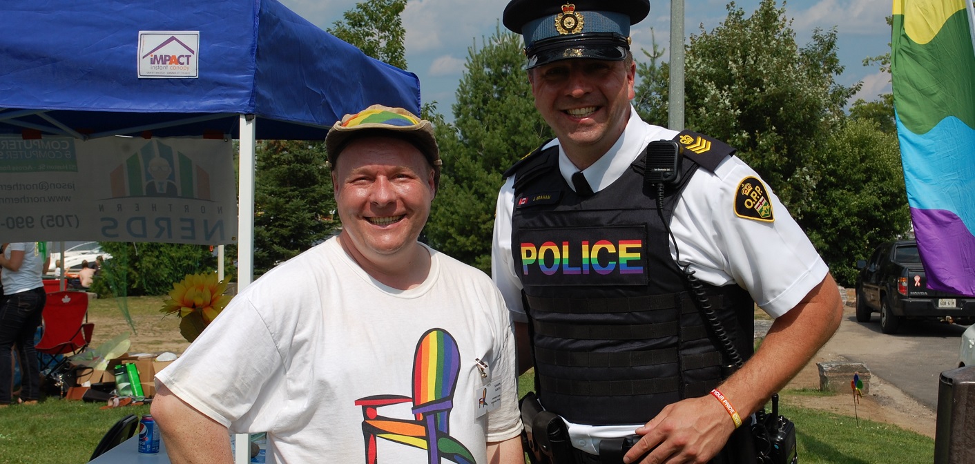 Muskoka Pride Festival organizer Shawn Forth with Huntsville OPP Detachment Commander John Graham