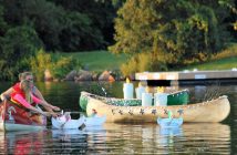Trapper-size paper sculpture canoes, created by local artist Patricia Astley, were accompanied by smaller canoes made by the community