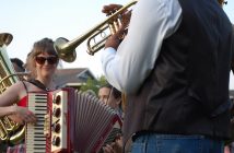 The Heavyweights Brass Band and The Boxcar Boys led the parade with joyous music