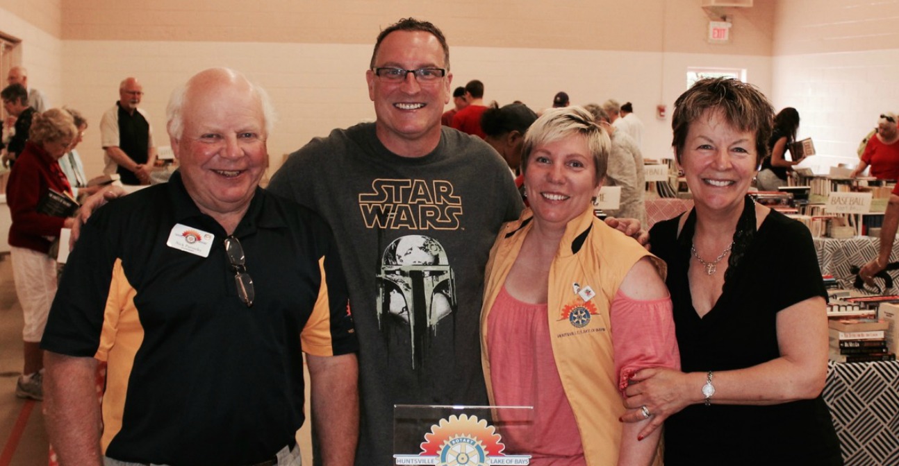 Nick Paroschy, Steve Lavigne, Suzanne Willett and Lynn Doyle from the Rotary Club of Huntsville Lake of Bays are all smiles at the book sale.