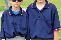 Two young umpires from the Hornets' Pee Wee Select team called the game (from left) Aiden Courville, age 12, and Nolan Quesnelle, age 11