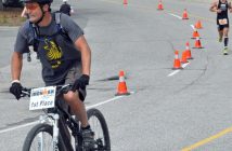 Volunteer cyclists lead the top racers to the finish line (Photo: Cheyenne Wood)
