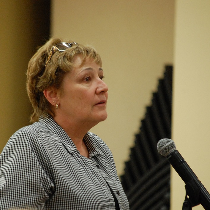 Carolynn MacKay speaks to the future of Madill Church at the public meeting. She is now the president of the newly formed Madill Church Preservation Society
