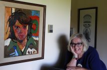 Pamela Smyth with one of the Indigenous paintings in her farmhouse