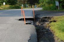 This type of washout damage that undermined the sides of roads could be seen in many places in Huntsville
