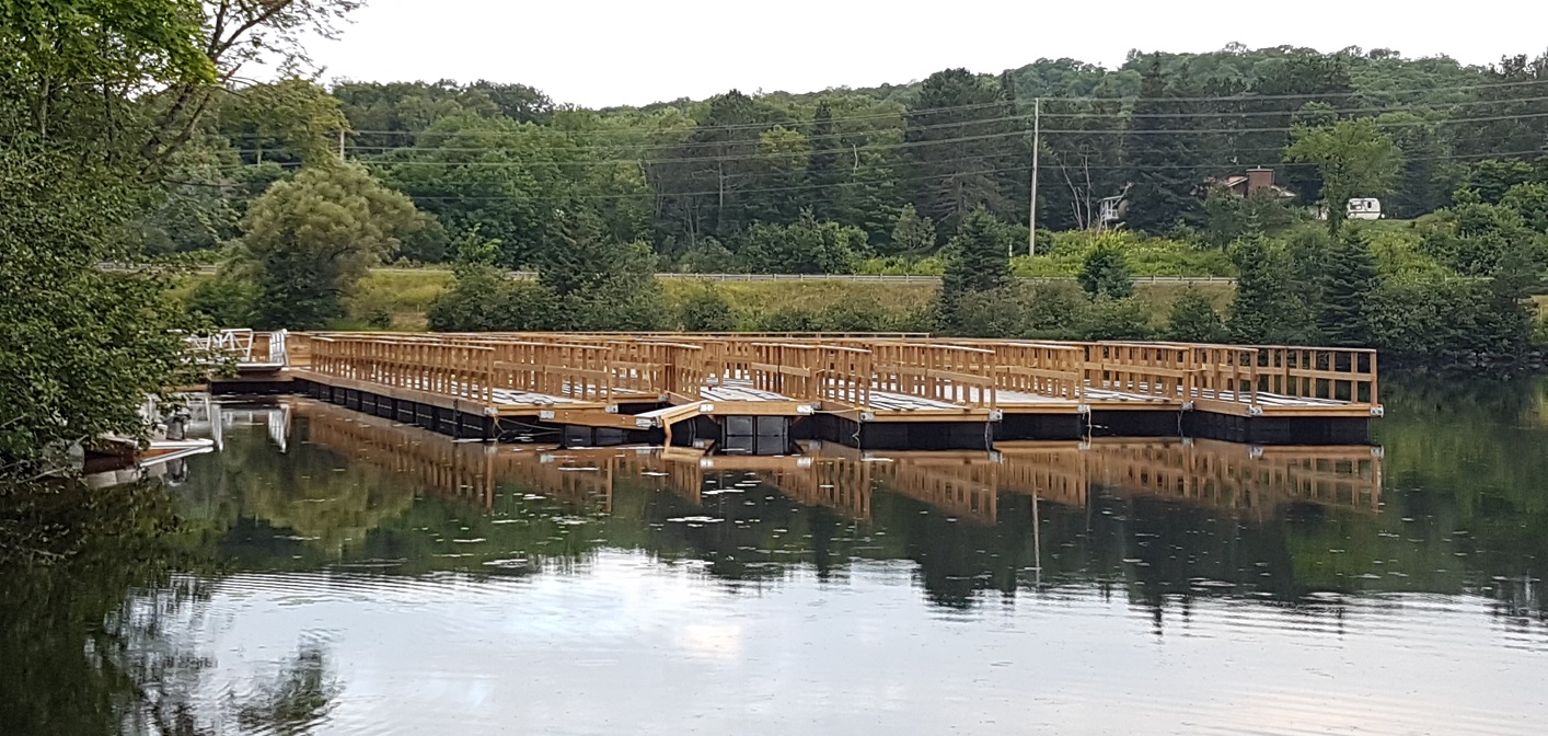 Floating trail sections await installation for the extension to Hunters Bay Trail