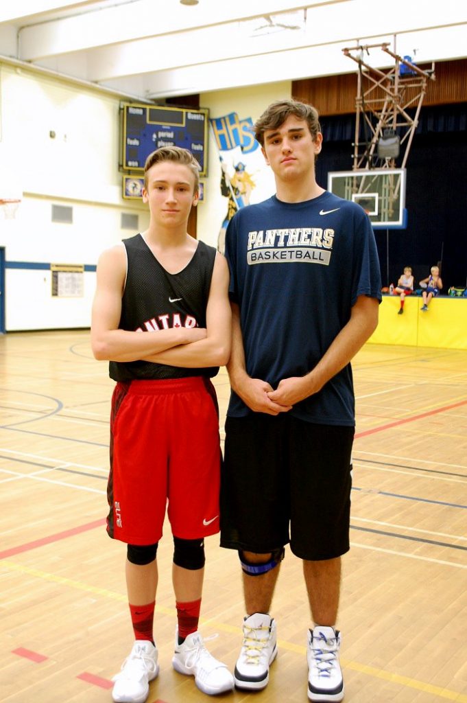Seth Cooper (left) and Spencer Hewitt encourage younger players to keep practicing and building their skills