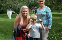 Jessica, Davyn and Jo Walton show off some of their apple-picking haul