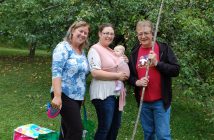 Jodie Auckland, Emilie Stroud, Andy Bartle, and Maggie the dog brought baby Henley for her first apple festival