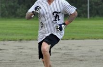 A Knots player rounds the bases