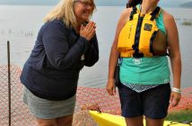 Fairvern's Administrator Tracy Badger (left) reacts to staff member Marlene Müller's fundraising total for this year: $4,705