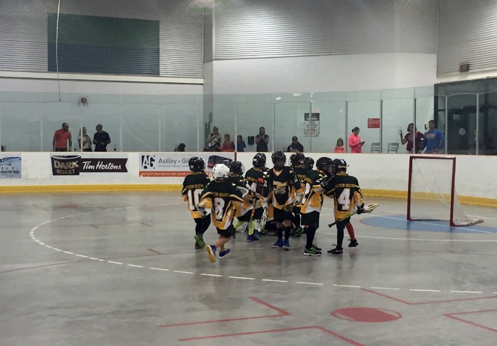 The Preston Heating Tykes celebrating a 5-3 win over Centre Wellington at The Legends Centre in Oshawa