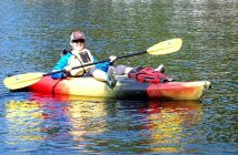 Dr. Deb Harrold made herself comfortable while ensuring the safety of the swimmers