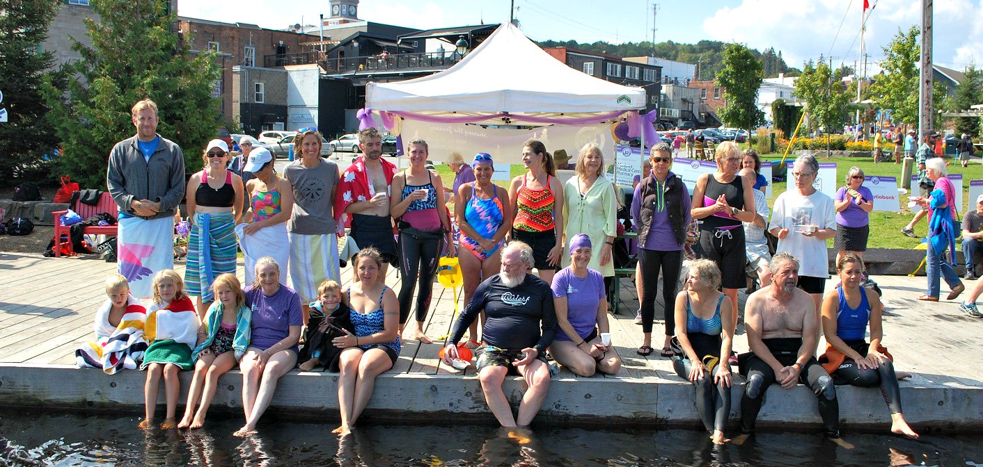 Some of the swim challengers – who swam 3km, 2km, or 1km – on the Town Dock post-swim