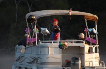 A festive support boat followed Joy for the duration of her swim