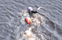 One of the first of the 3km challengers passes under the Centre Street bridge