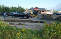 A crew was repairing the sinkhole at Tim Horton's on Hanes Road at West Road Wednesday morning.