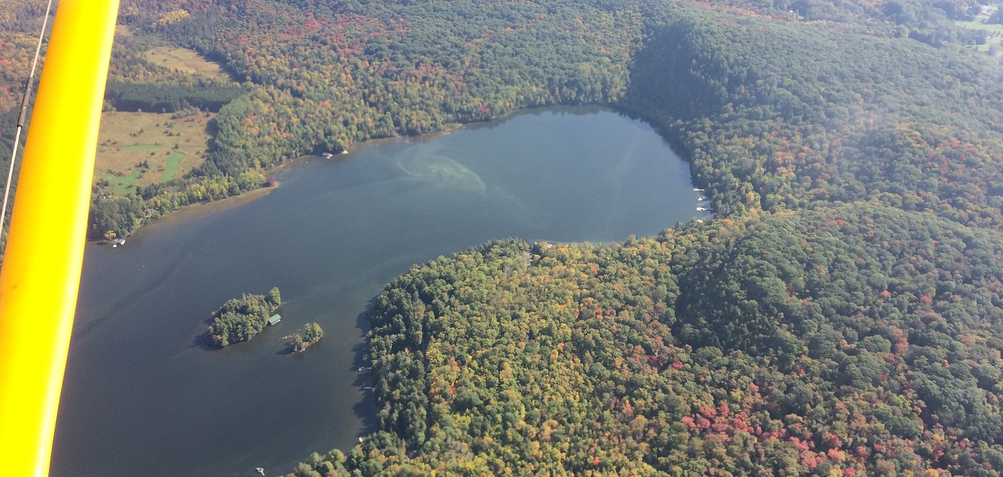An aerial view of Wolf Bay in Peninsula Lake showing the development of an algae bloom (Photo by Doppler reader Brian Tapley)