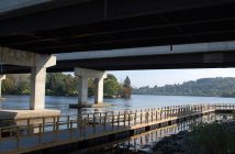 The floating trail passes under the Vernon Narrows bridge