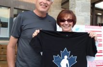Steve and Deborah Ainger proudly display this year's t-shirt