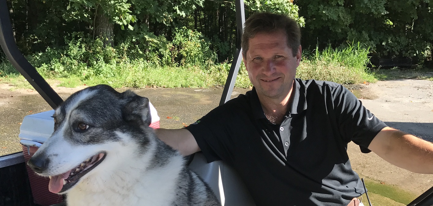 Keith Walton and his dog Molly, about to check on the links at Grandview’s Mark O’Meara course