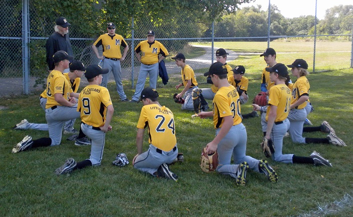 The Muskoka Hornets Bantam Select huddle before the first game of the provincials