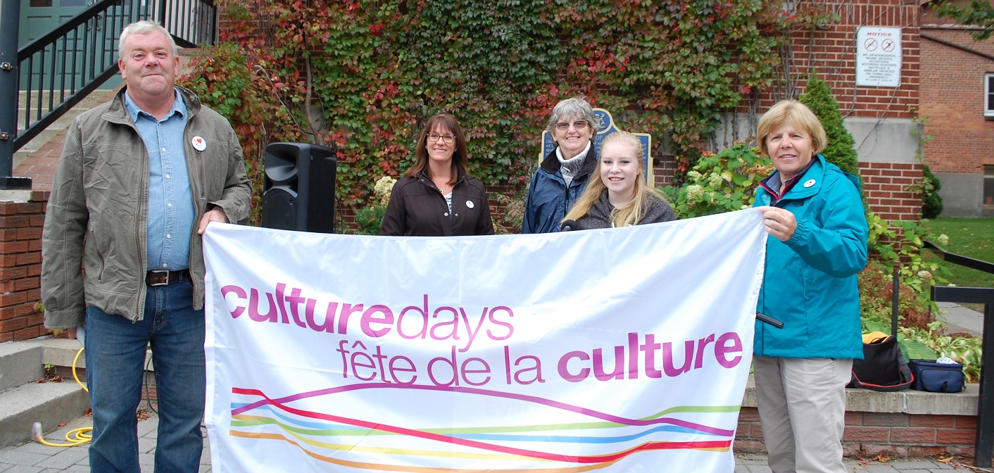 The Culture Days 2017 flag raising with (from left) Councillor Jason FitzGerald, Town CAO Denise Corry, Culture Days organizer Pam MacKenzie, musician Briar Summers and Deputy Mayor Karin Terziano