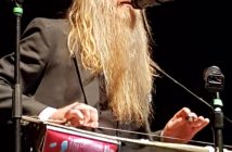 Sean Cotton plays the canjo