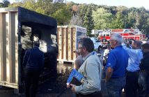 Attendees at the Ontario Building Officials Association conference inspect the damage