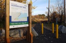 A new sign welcomes people to the start of the extension at the end of East Airport Road