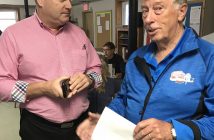 Co-chair Eric Spinks (right) talks with Steve Chenier, executive director of the Canadian Curling Association