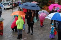 Eager trick-or-treaters wait outside the Algonquin Theatre for the annual Tiny Tots parade to begin