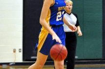 Senior Emma McAlpine joined her teammates on the court in the final seconds of the game