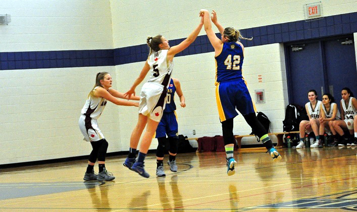Joey Currie takes a shot on basket