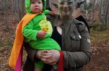 Finnley Lorbetskie (left) keeps a tight grip on a candy bar with Andrea Coulter