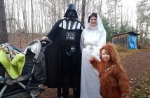 The Griffin family (from left) Sawyer, a sleeping Ewok in the stroller, Shane as Darth Vader, Kelly as Princess Leia, and Emelia as Chewbacca