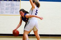 Celeste Dupuis drives past a Lo-Ellen Park player (Photo: Dawn Huddlestone)